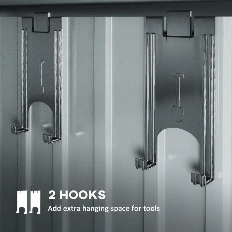 Close-up of the sliding door track and handles on the front of the shed