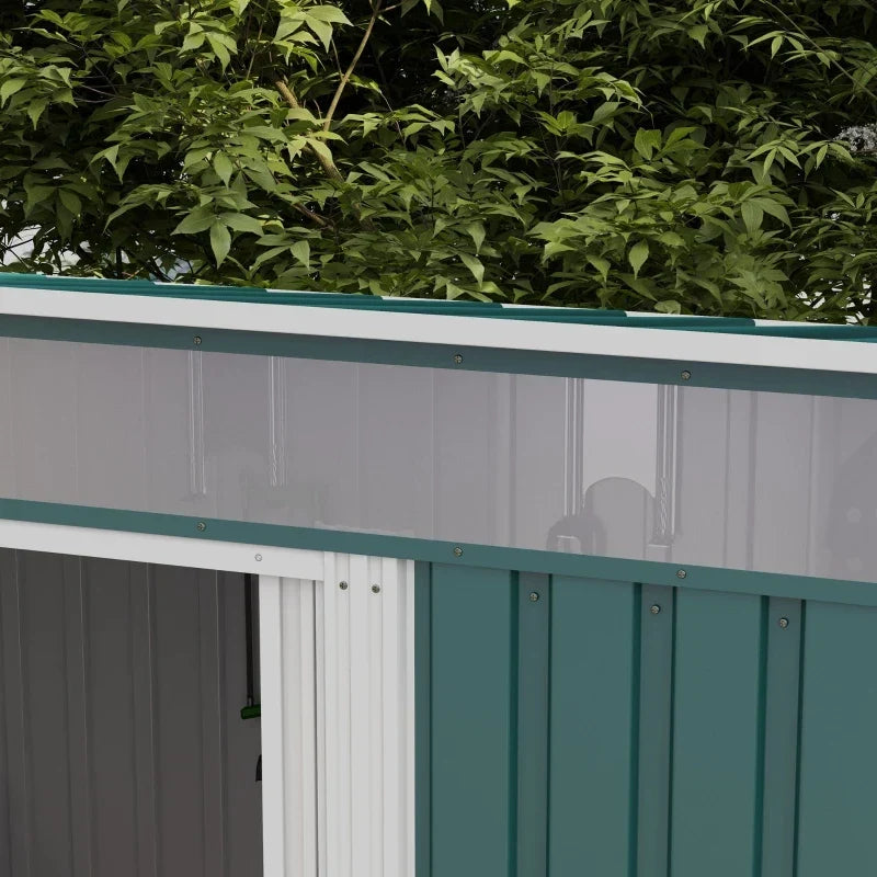 Close-up of the white roof trim and clear acrylic window band along the shed front