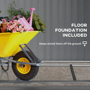 Steel floor foundation frame included with the shed, with a wheelbarrow beside it