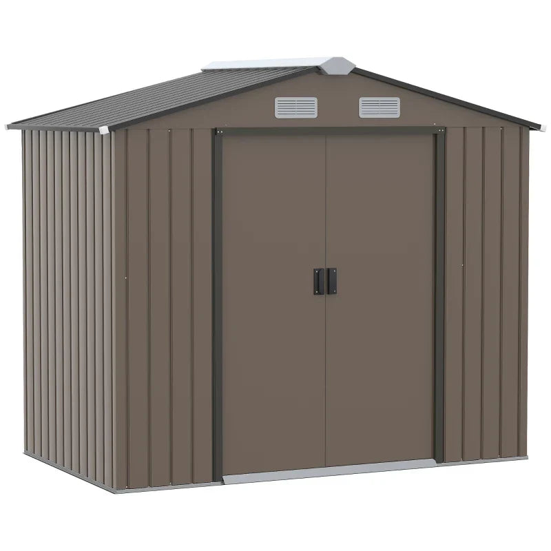Studio front view of the closed brown metal shed showing the two gable vents