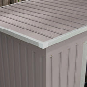 Close-up of the ribbed steel pent roof panels and the white edge trim along the shed corner