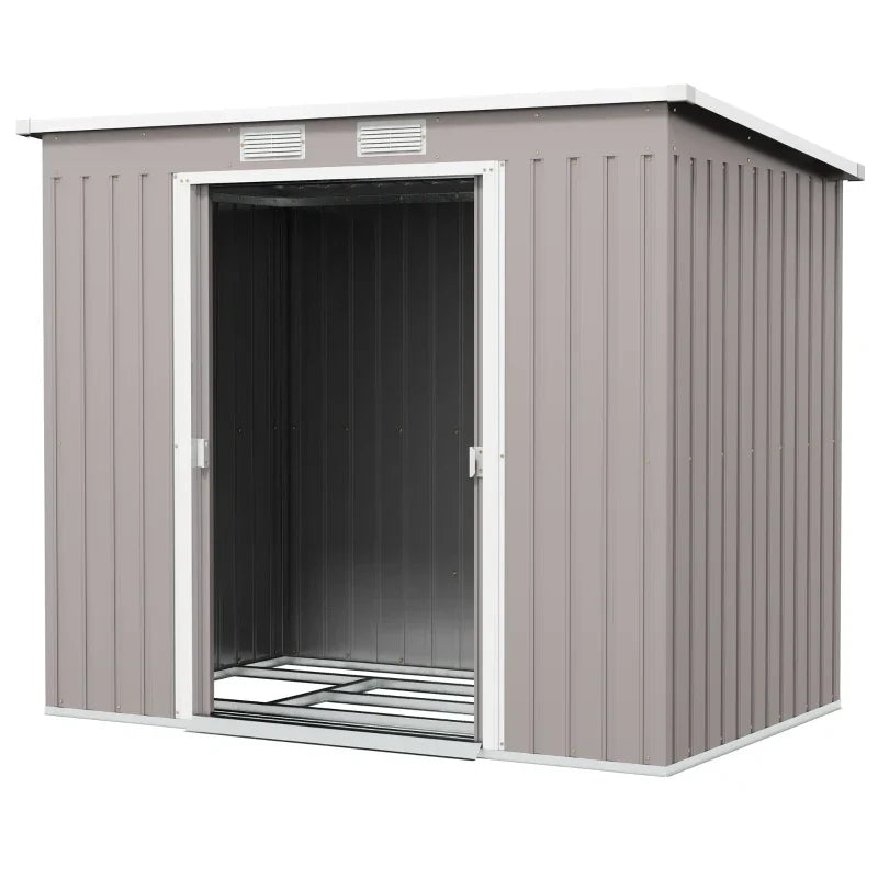 Studio view of the shed with one sliding door pushed open, showing the empty interior and the base frame