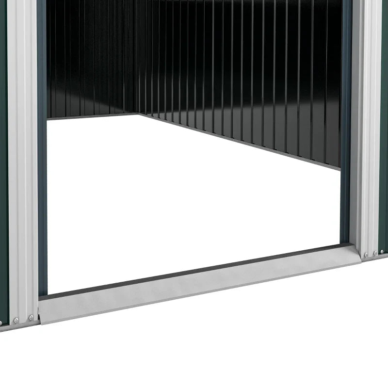 Close-up of the open sliding door with the silver floor track and white door frame at the threshold