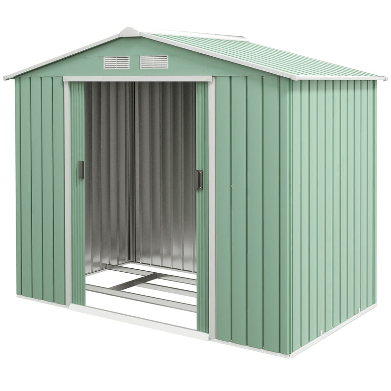 Studio front view of the light green shed with doors open showing the foundation rails