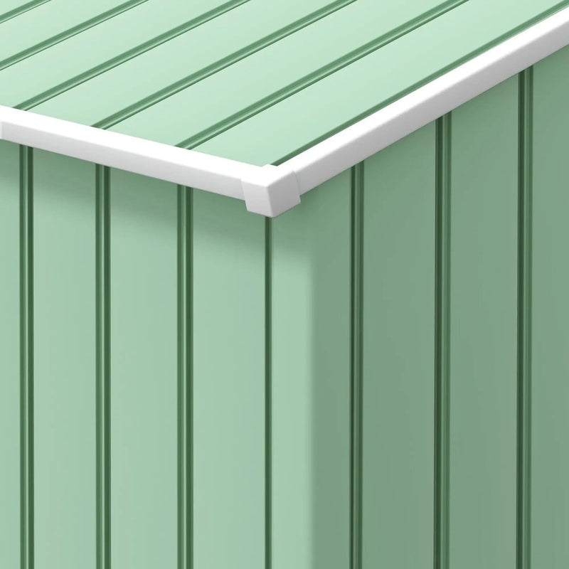 Close-up of the light green ribbed wall panels and the white roof edge trim
