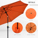 Image of an orange tilting patio parasol