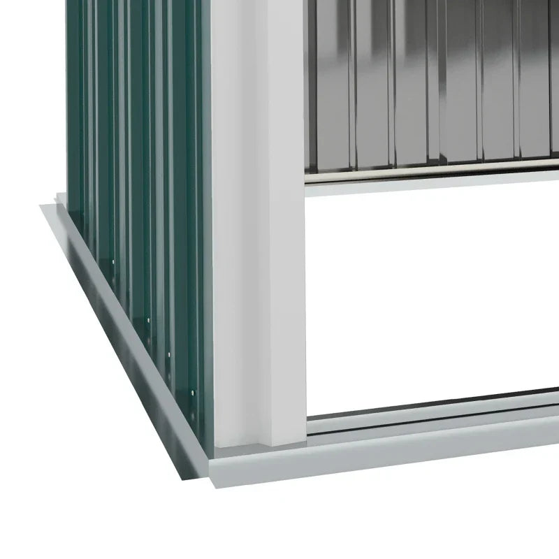 Close-up of the shed's open base rail at ground level, showing there is no floor panel fitted