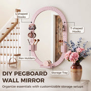 Pegboard mirror in a hallway with hooks, pen holders and storage tray labelled