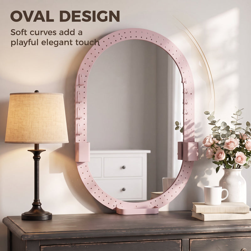 Oval mirror with pegboard frame above a dresser next to a table lamp