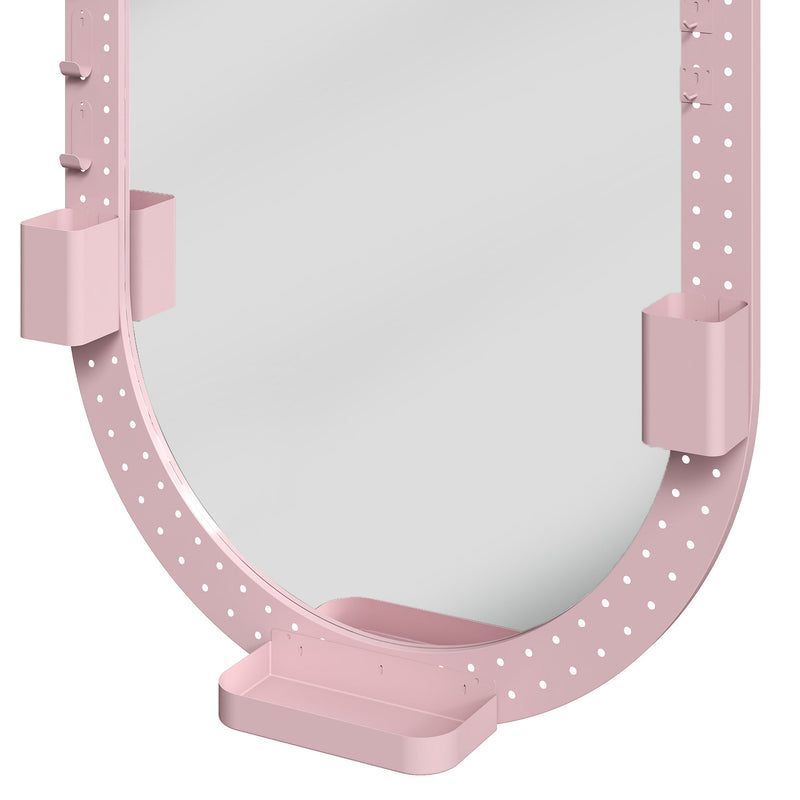 Close-up of the pegboard frame with pen holders and storage tray on the oval mirror