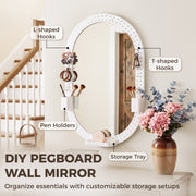 Oval pegboard mirror labelled with L-shaped hooks, T-shaped hooks, pen holders and storage tray