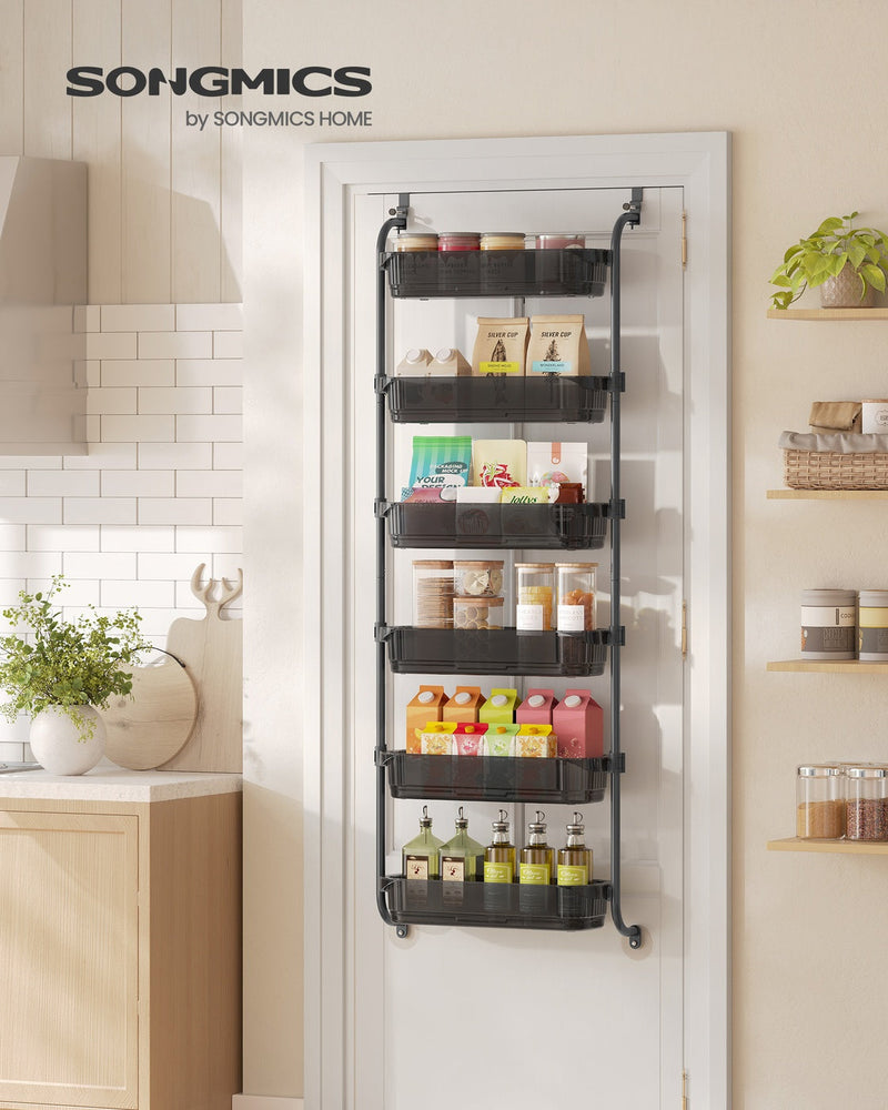 Black over-the-door organiser holding jars and packets on a kitchen door in a Songmics lifestyle photo