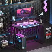 Black Gaming Desk with LED Lights and Power Outlets 100 x 60cm Z Shaped by HOMCOM