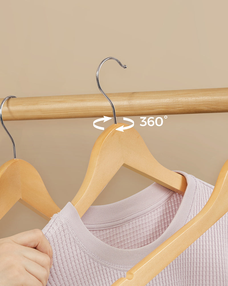 Close-up of the metal hook rotating 360 degrees on the wooden hanger