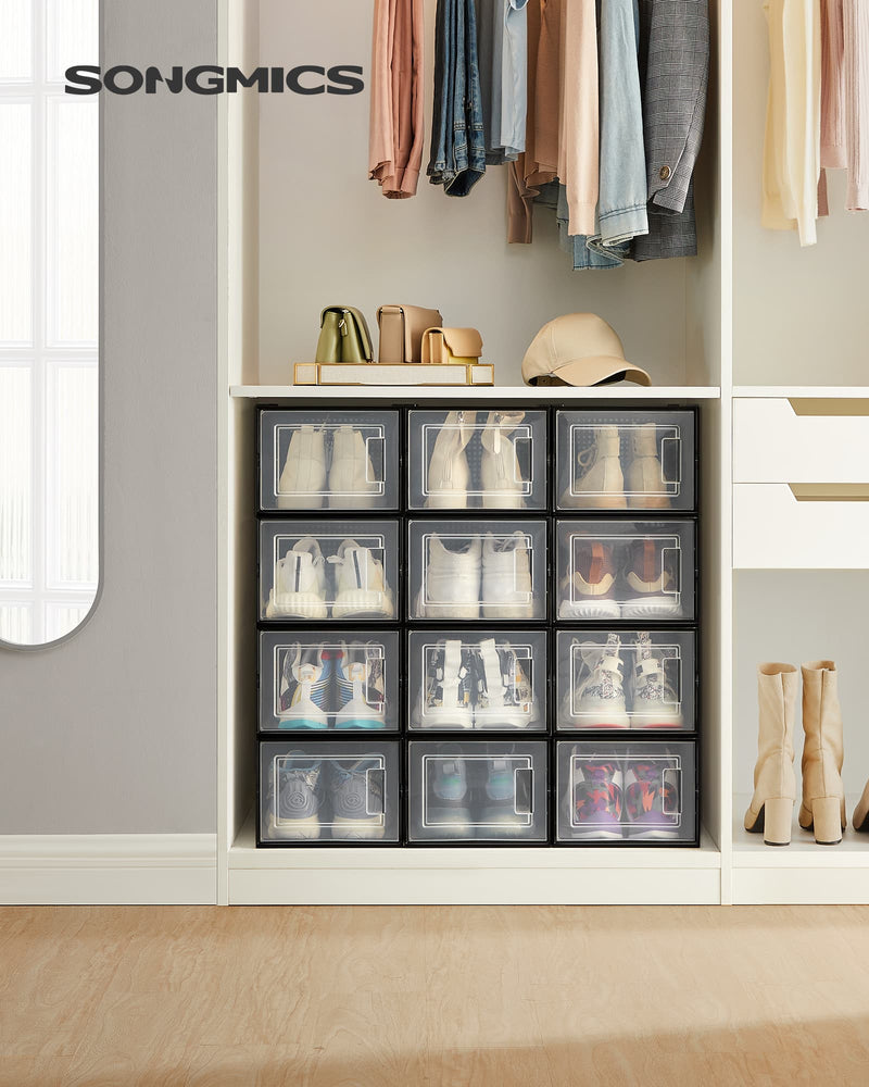 Clear shoe boxes filled with trainers and shoes on a shelf in a wardrobe