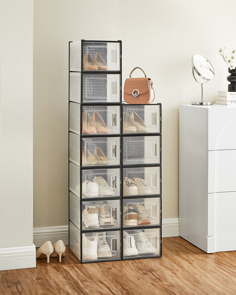 Close-up of a shoe stored inside a clear stackable storage box with front door open