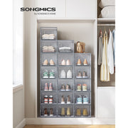 The stacked shoe boxes filling a wardrobe alcove, shown with the Songmics brand logo