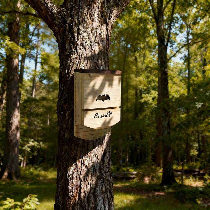 PawHut bat box mounted on a tree in a woodland garden setting