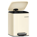 Sand beige stainless steel pedal bin with lid open, studio shot