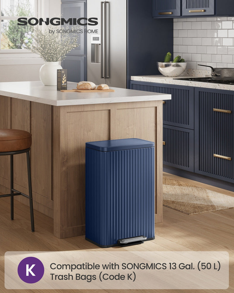 Midnight Blue pedal bin styled beside a kitchen island in a navy kitchen