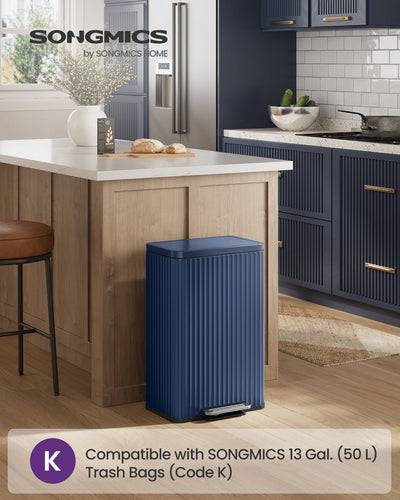 Midnight Blue pedal bin styled beside a kitchen island in a navy kitchen