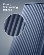 Close-up of the fluted shimmering texture on the Midnight Blue steel bin surface