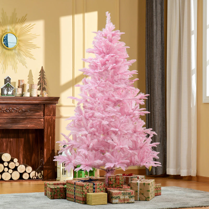 6ft pink Christmas tree in a warm living room next to a fireplace with gifts underneath