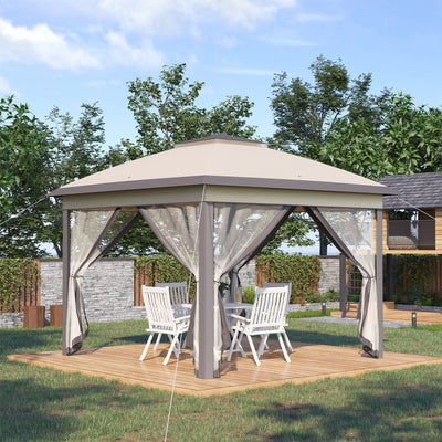 The beige gazebo set up on a garden deck over a table and two chairs