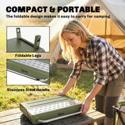 Outsunny BBQ grill folded and carried by its stainless steel handle, showing the foldable legs