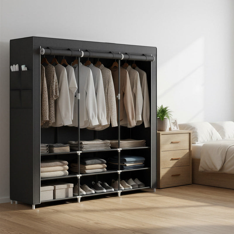 Black fabric wardrobe in a bright bedroom with shirts hanging and trainers below