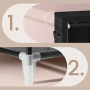 Close-up of the anti-tip wall fixing and the white plastic tube joint