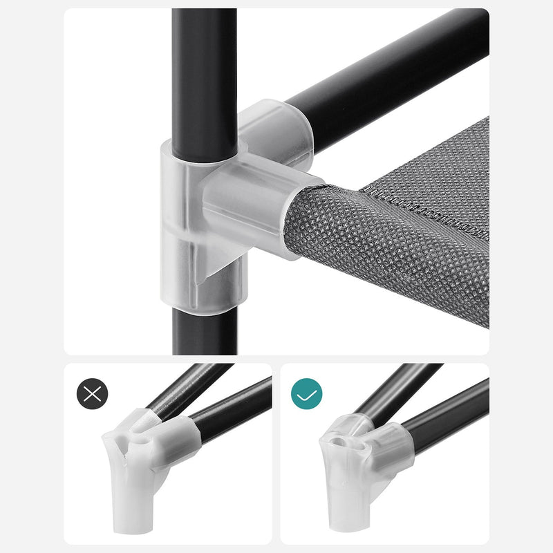 Close-up of a white plastic connector joining two steel frame tubes