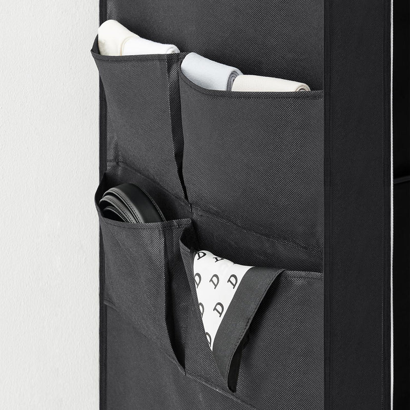 Close-up of the 4 side pockets holding rolled towels and a belt