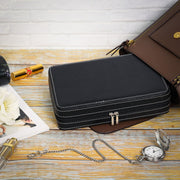 Watches stored securely in the padded slots of the case