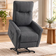 Dark grey power lift recliner in the raised position beside a wooden side table