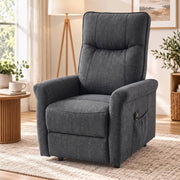 Front view of the dark grey power lift recliner in a bright living room
