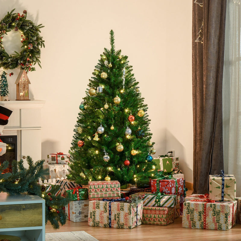 5ft decorated Christmas tree in a cream living room surrounded by wrapped gifts
