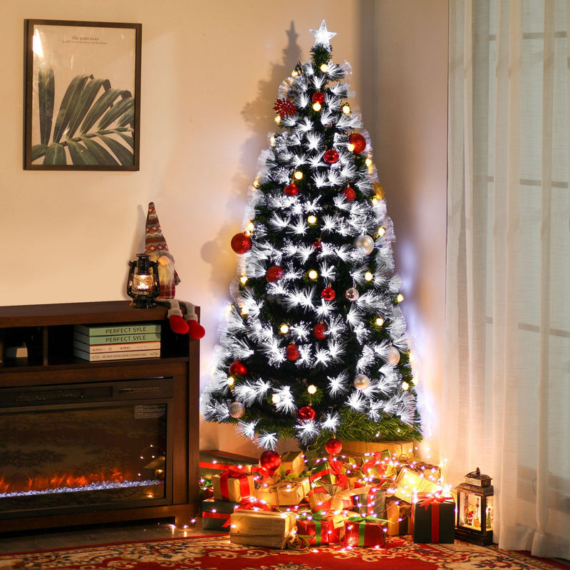 Fibre optic Christmas tree with red baubles in a living room with gifts under the tree