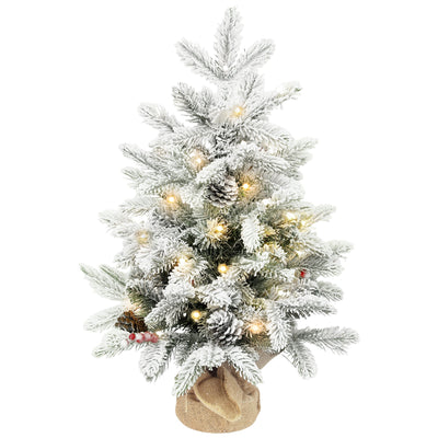 Snow-flocked 60 cm tabletop Christmas tree with red berries, lights and a linen-look base on white