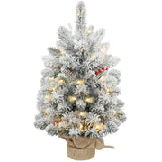 Slim snow-flocked 60 cm tabletop Christmas tree with red berries, lights and a linen-look base on white