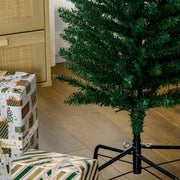 Close-up of the steel tree base and lower branches beside wrapped presents