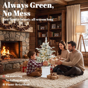 Family with a lit 3ft flocked tree by a fireplace under an always green, no mess heading