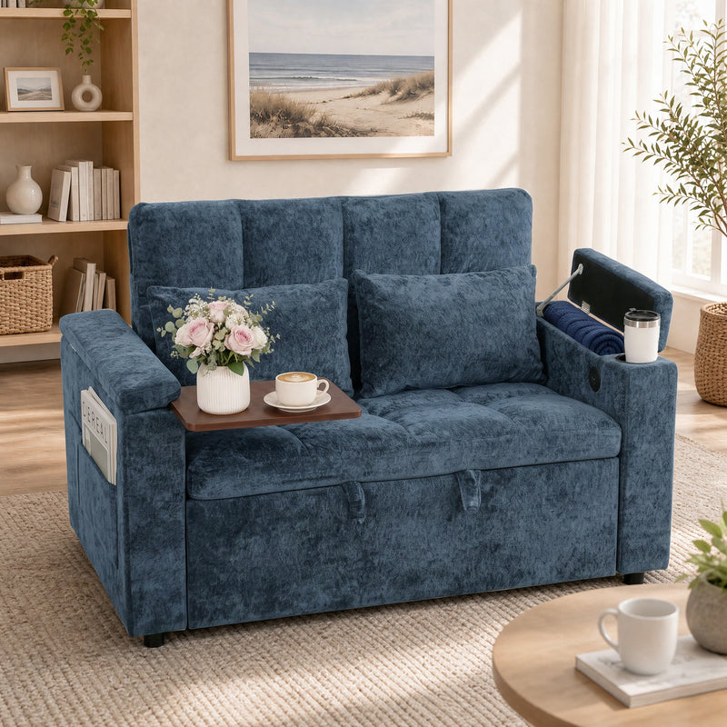 Dark blue sofa bed with a tray folded out over the armrest holding flowers and coffee