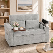 Grey sofa bed with a tray folded out over the armrest holding flowers and coffee