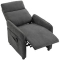 HOMCOM push back manual recliner armchair in dark grey with an integrated footrest reclined