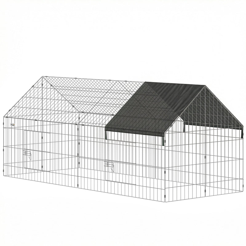 Black and silver metal rabbit run with a shade cover over one end, on a plain background