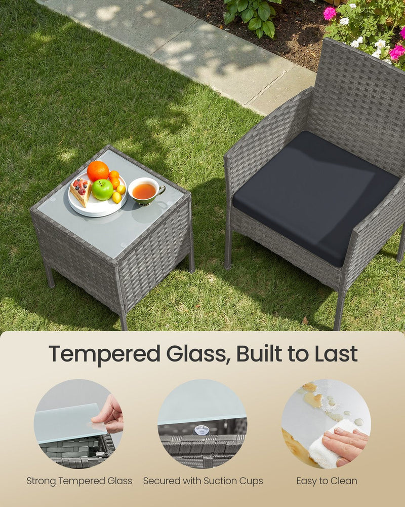 The rattan table and one chair on a lawn, above tempered glass and suction cup detail shots