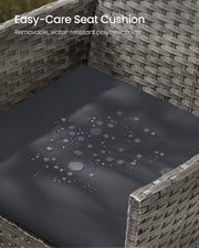 Water beading on the dark seat cushion, showing its water-resistant polyester cover
