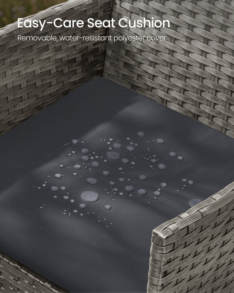 Water beading on the dark seat cushion, showing its water-resistant polyester cover