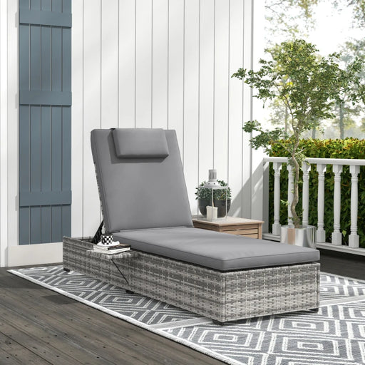 Image of a grey rattan reclining sun lounger